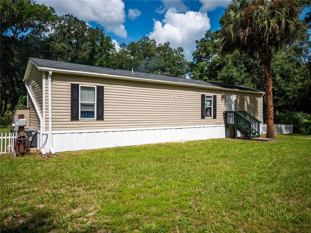 a view of outdoor space and yard