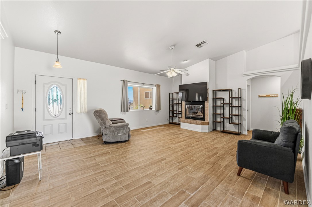 9332 Branded Road Kingman, AZ 86401 - Photo 7 of 44 a living room with furniture and wooden floor