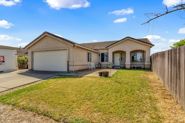 a house view with a garden space