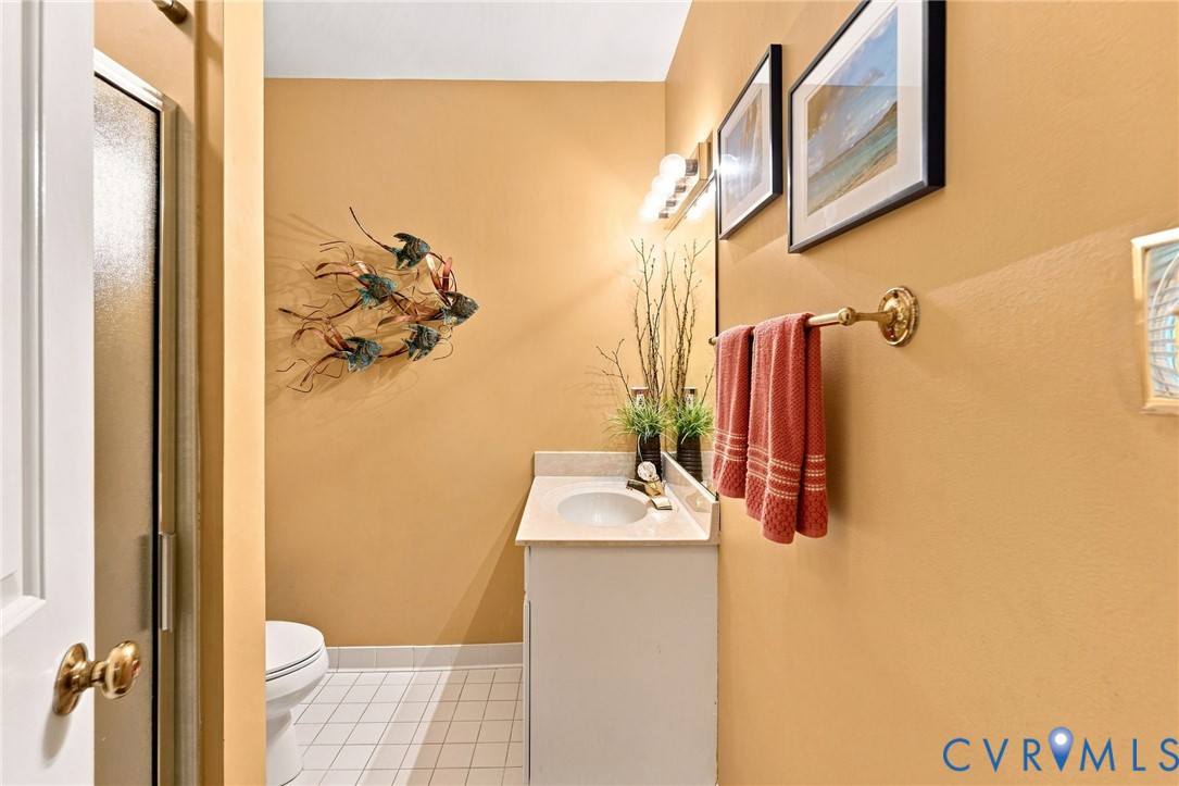 3950 Reeds Landing Circle Midlothian, VA 23113 - Photo 43 of 49 White tile flooring, single vanity with integrated