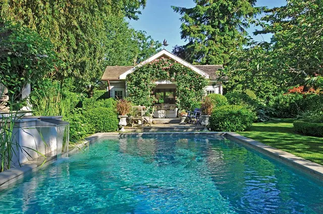 a view of a water fountain with a bench