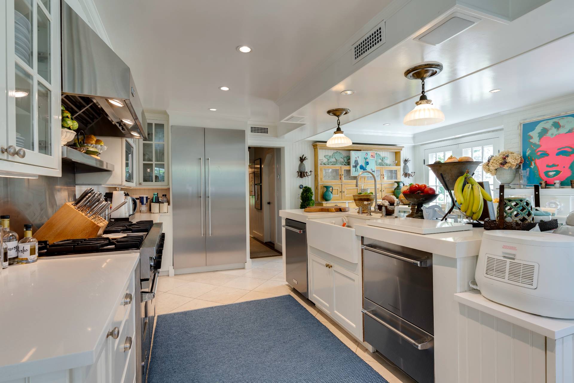 12 Huntington Lane Water Mill, NY 11976 - Photo 27 of 50 a kitchen that has a lot of cabinets in it and appliances