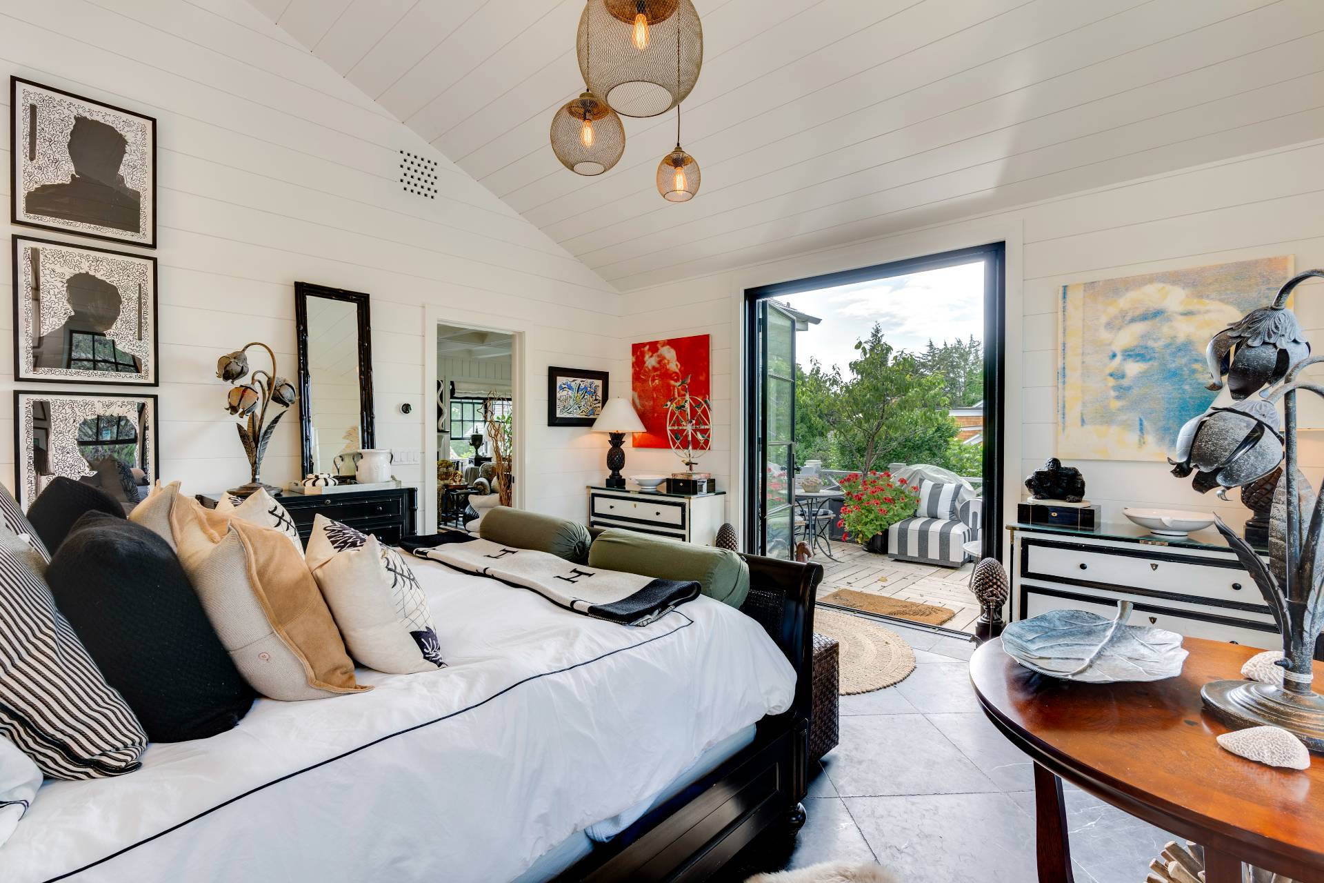 12 Huntington Lane Water Mill, NY 11976 - Photo 37 of 50 a bedroom with a bed gym equipment and a large window