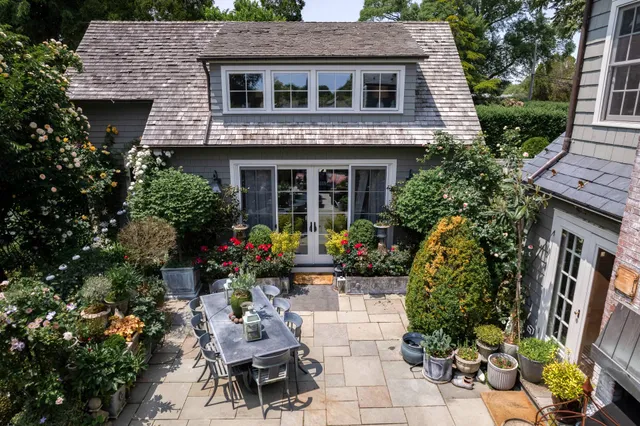 a bedroom with a large bed and a couch