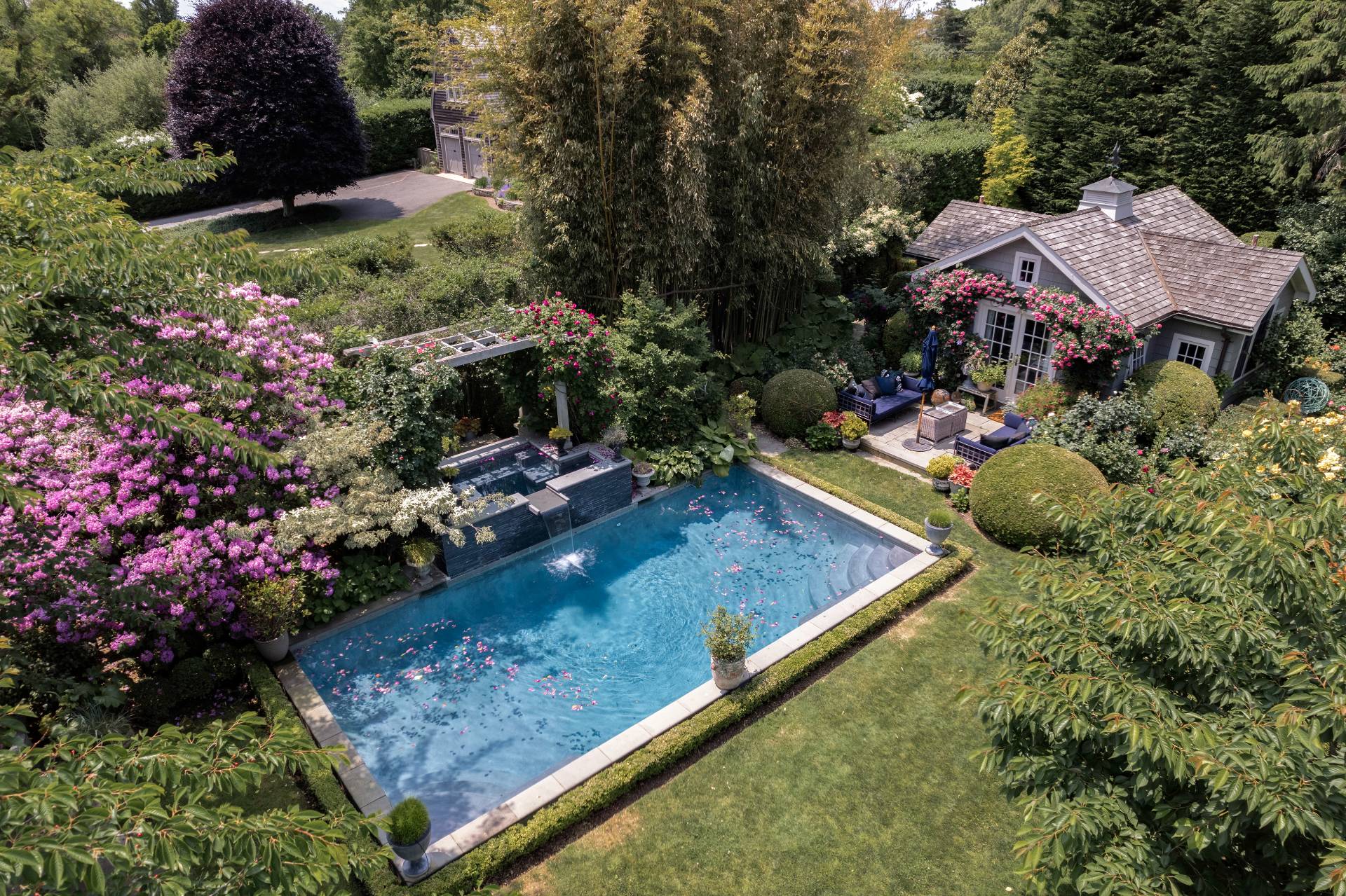 12 Huntington Lane Water Mill, NY 11976 - Photo 6 of 50 a view of a house with a backyard and sitting area