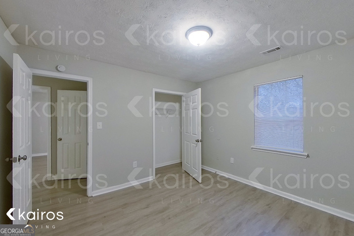 100 Deer Parkway Athens, GA 30605 - Photo 15 of 22 a view of an empty room with wooden floor