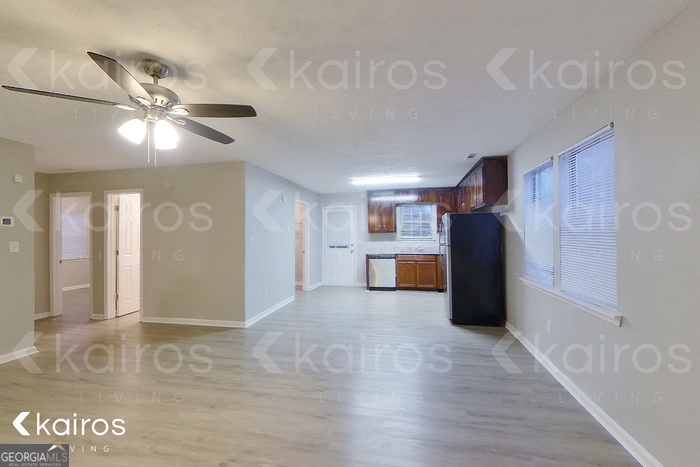 100 Deer Parkway Athens, GA 30605 - Photo 2 of 22 a view of a livingroom with furniture ceiling fan and window
