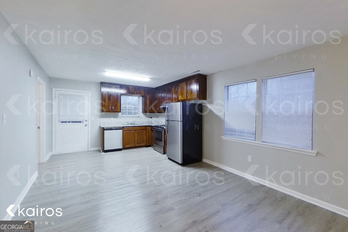 100 Deer Parkway Athens, GA 30605 - Photo 3 of 22 a view of kitchen with furniture and wooden floor