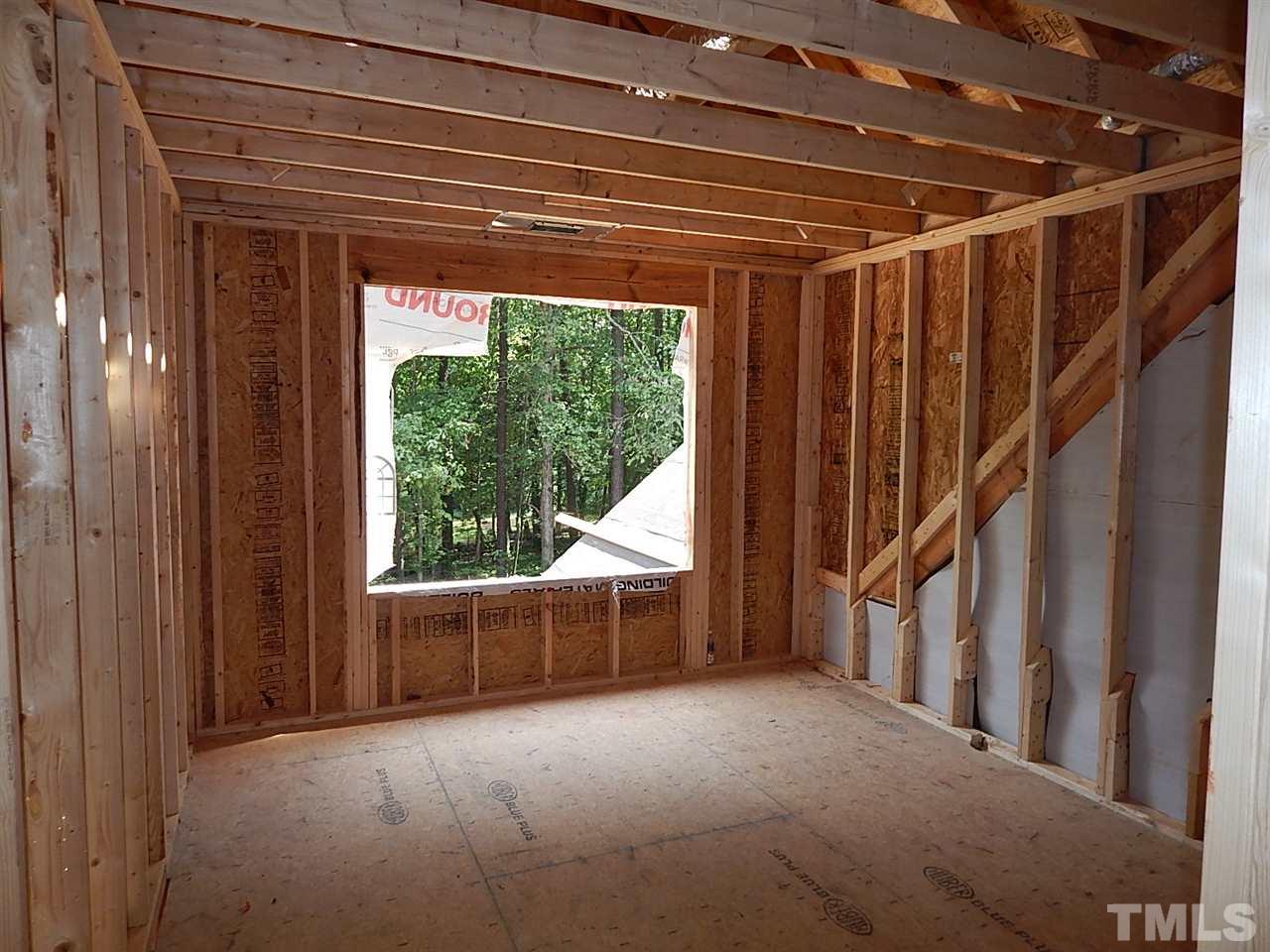 3804 Valley Stream Drive Raleigh, NC 27604 - Photo 17 of 24 a view of an empty room with a window and balcony