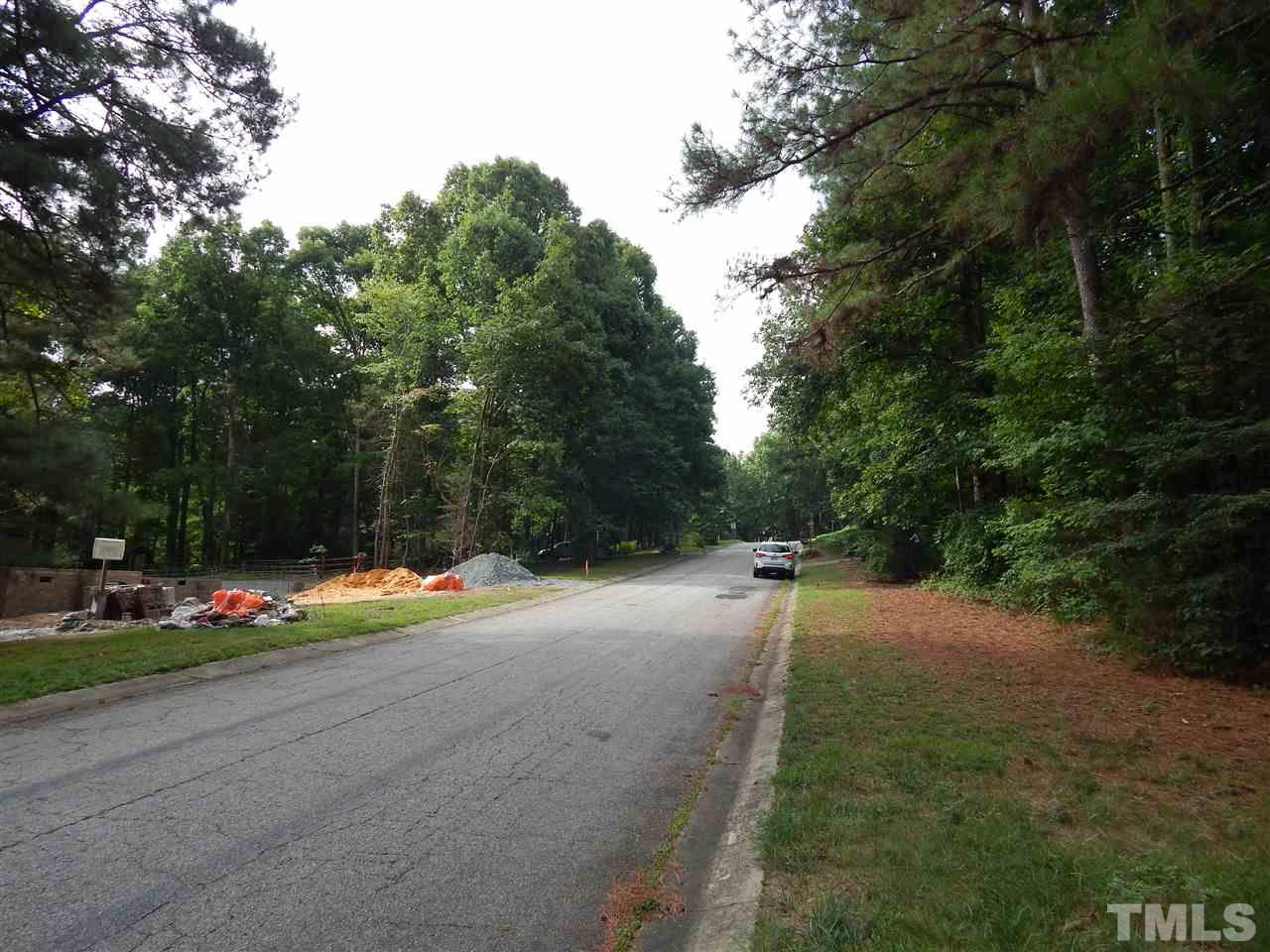 3804 Valley Stream Drive Raleigh, NC 27604 - Photo 22 of 24 a view of a road with trees
