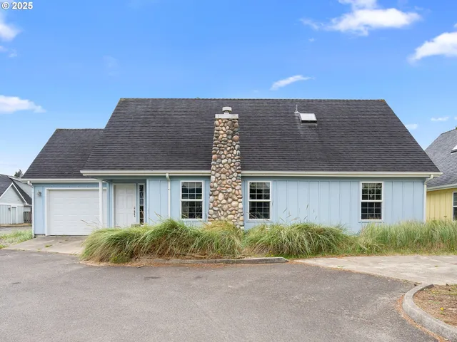 front view of house with a small yard
