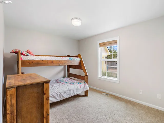 a view of room with closet and cabinet