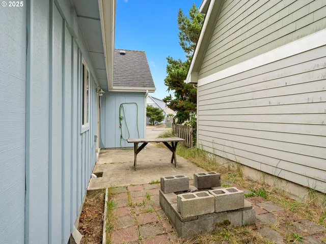 a view of a swimming pool with an outdoor space and seating area