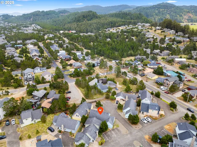 a view of a city with mountains in the background
