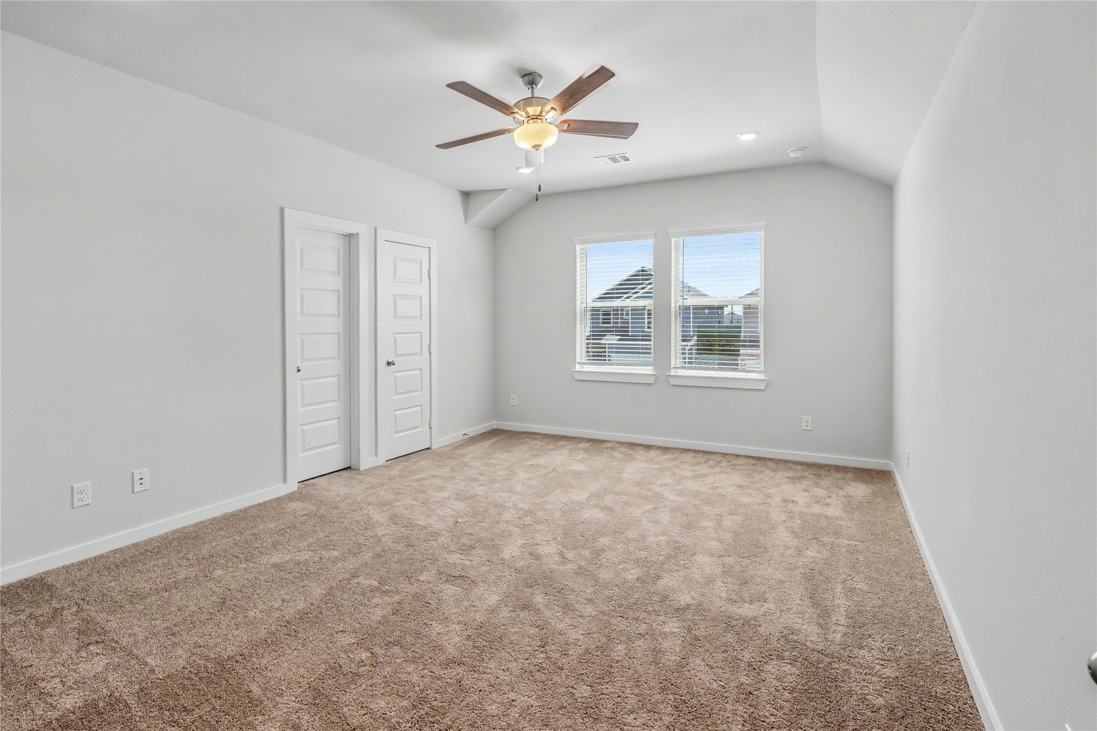 6426 Bolinas Court Rosharon, TX 77583 - Photo 38 of 49 an empty room with windows and ceiling fan