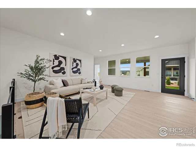 a living room with furniture and window