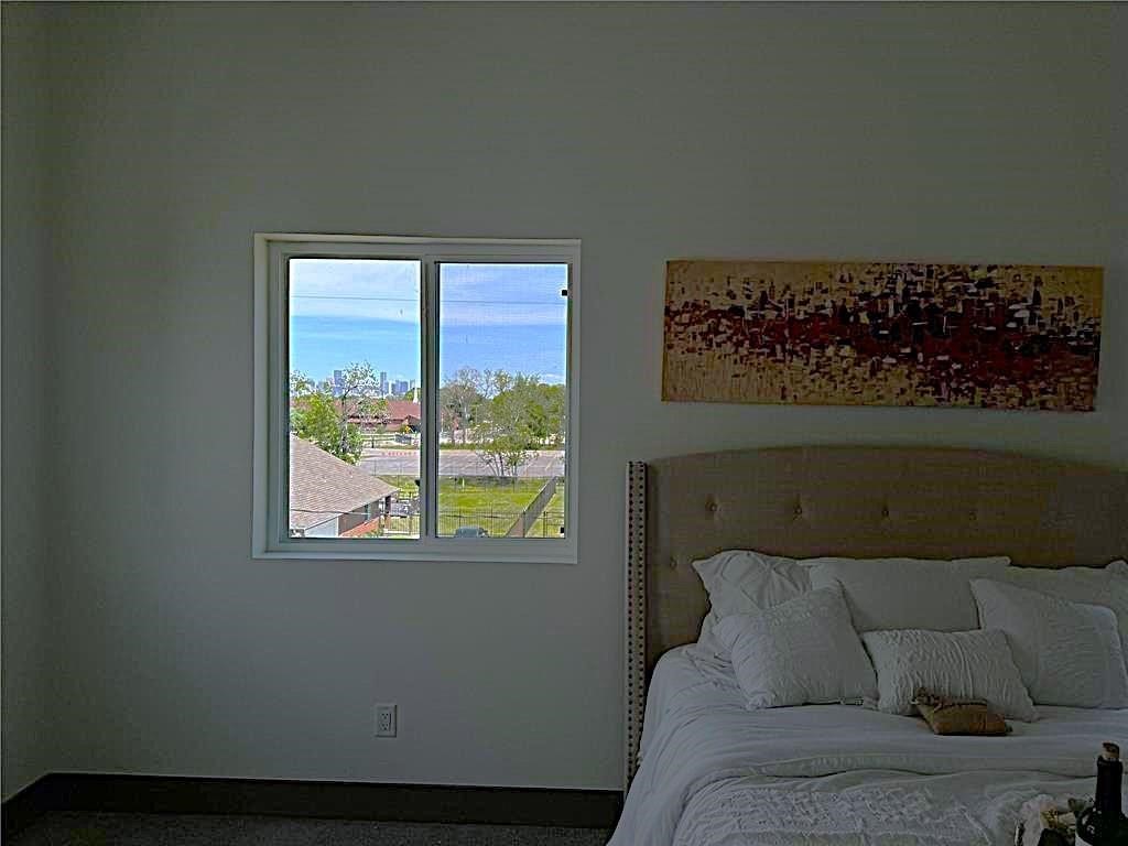 3620 Lehall Street Houston, TX 77021 - Photo 22 of 32 a living room with a couch and a window