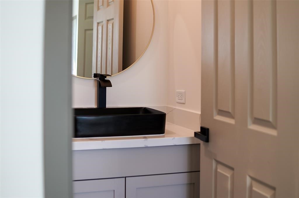 3620 Lehall Street Houston, TX 77021 - Photo 29 of 32 a close view of a sink and a cabinet in a kitchen