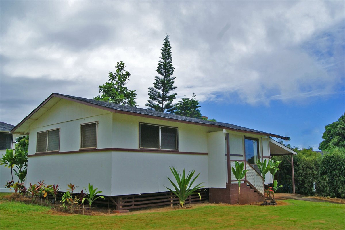5230 Kihei Road Kapaa, HI 96746 - Photo 3 of 24 a front view of a house with garden