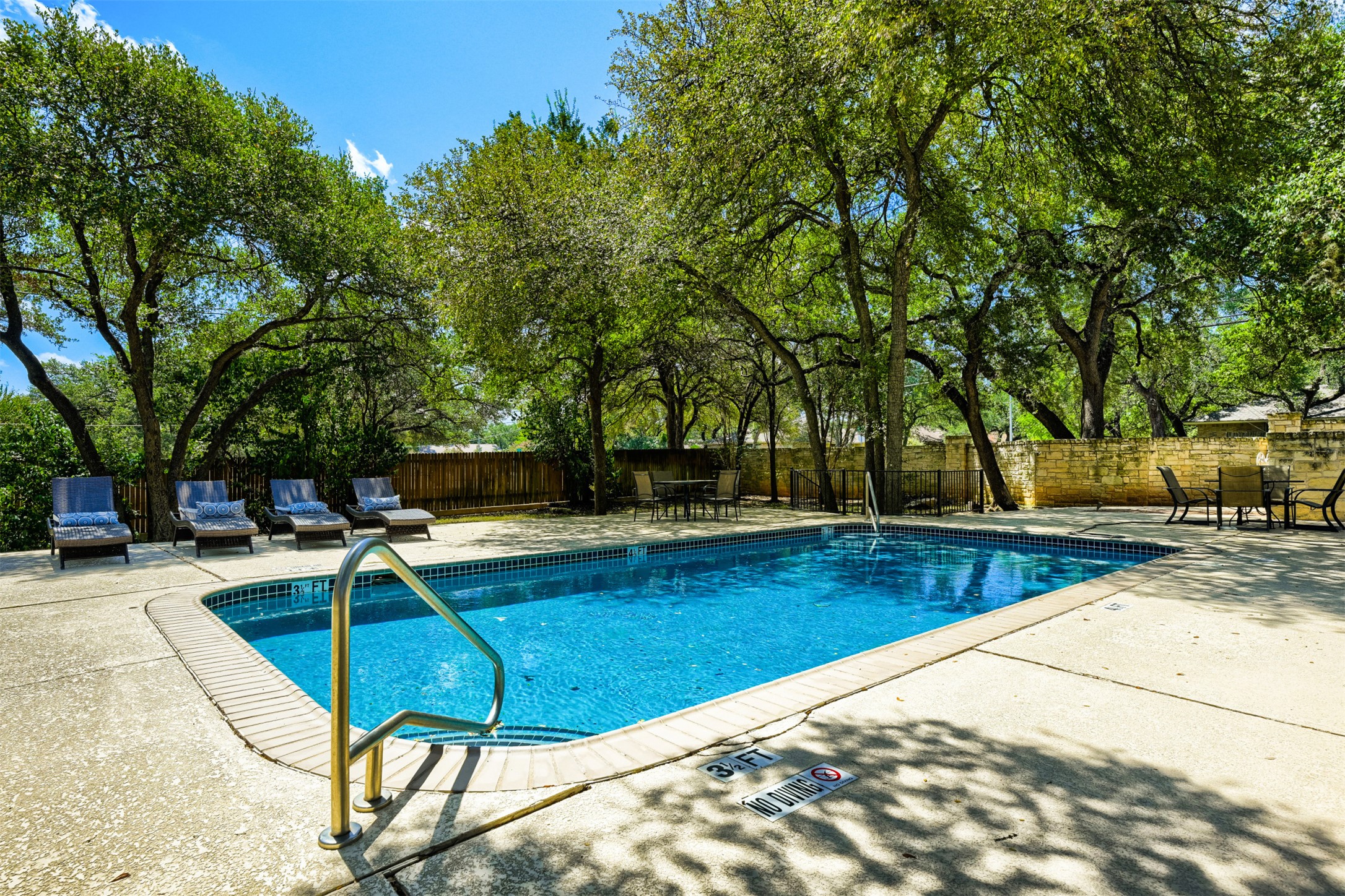4508 Duval Road, Unit 5503 Austin, TX 78727 - Photo 30 of 31 The community pool is ready for you! It's still summer, come enjoy a cool dip after the day ends.