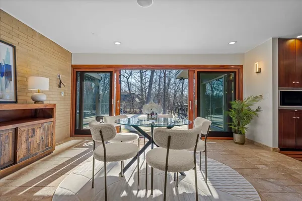 a outdoor space with furniture and front view of a house