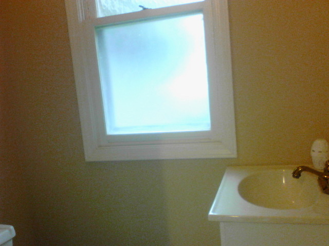 9 Crescent Road Lake Zurich, IL 60047 - Photo 12 of 14 a bathroom with a sink and a window
