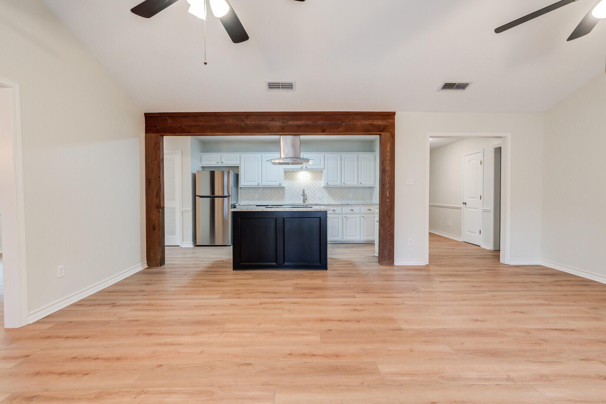 5309 77th Street Lubbock, TX 79424 - Photo 8 of 36 a view of a kitchen with a sink and a cabinet