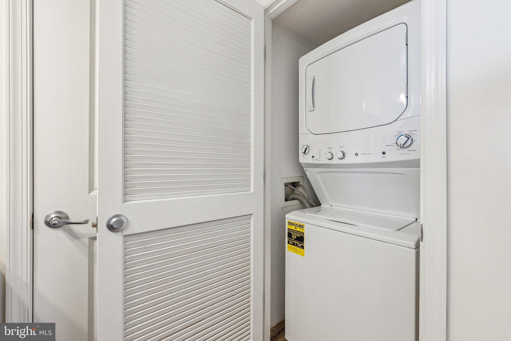 11800 Sunset Hills Road, Unit 1125 Reston, VA 20190 - Photo 19 of 24 a utility room with dryer and washer