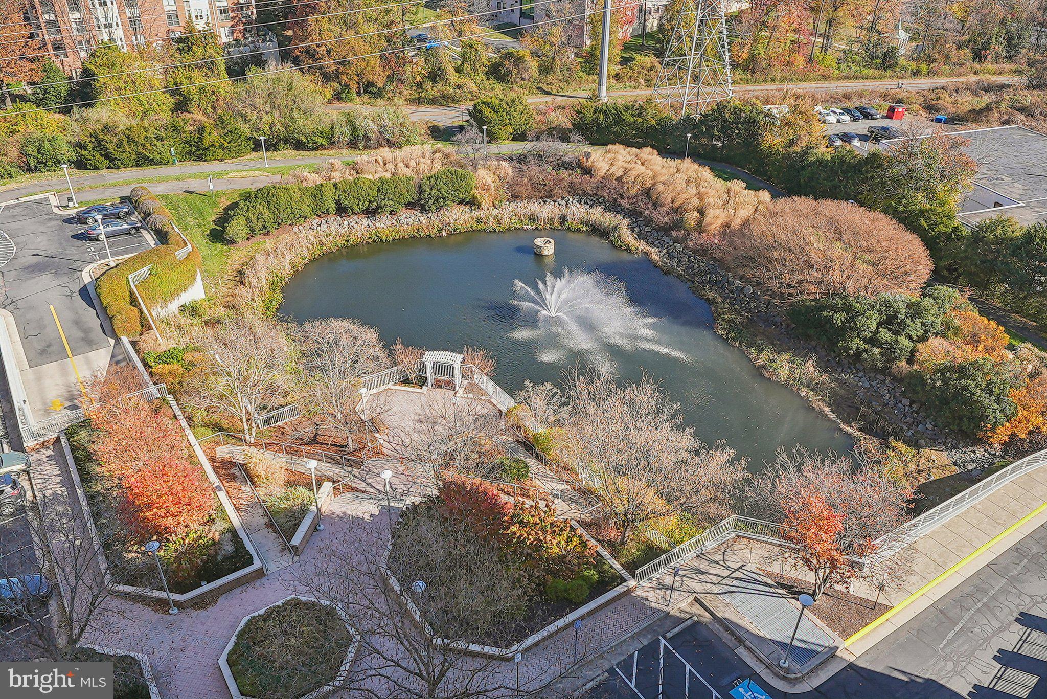 11800 Sunset Hills Road, Unit 1125 Reston, VA 20190 - Photo 23 of 24 a view of a lake in middle of the town