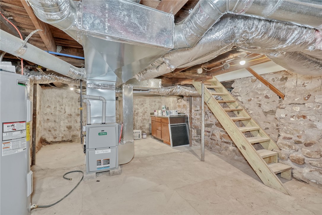 5422 Lincoln Road Walworth, NY 14519 - Photo 37 of 49 Stone Basement with new staircase and concrete flo