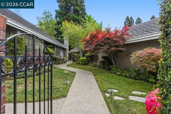 a front view of a house having yard