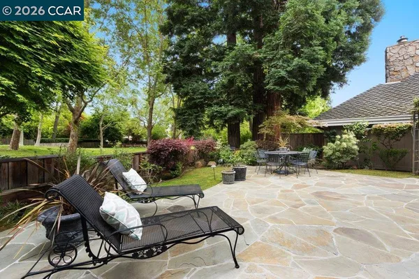 a view of a backyard with a garden
