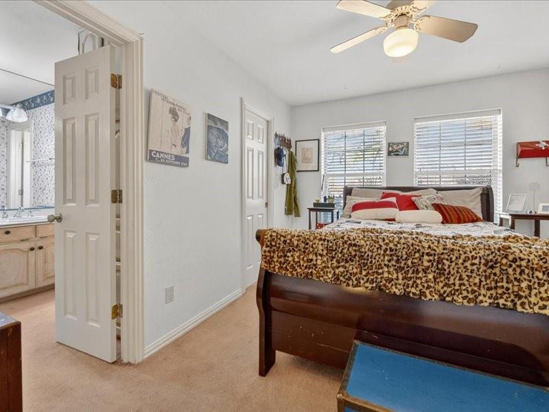 1704 South Bowen Road Pantego, TX 76013 - Photo 29 of 37 Bedroom 2 furniture not provided and old carpet pictured