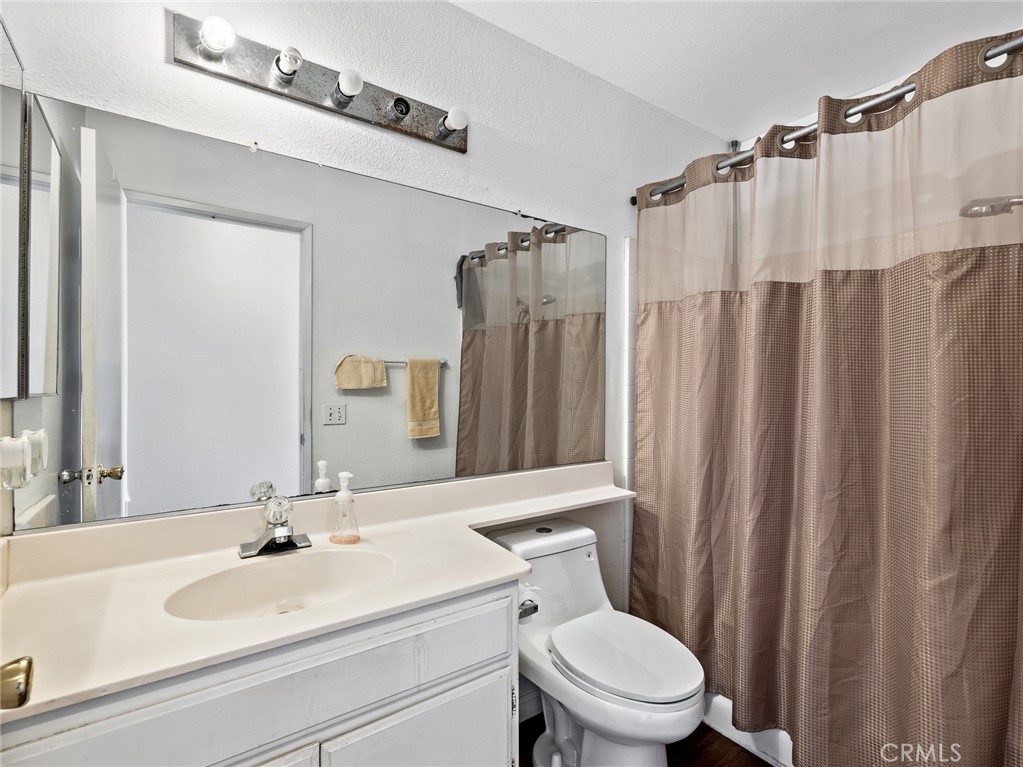 11068 Tamarisk Road Adelanto, CA 92301 - Photo 14 of 21 Hall way bathroom