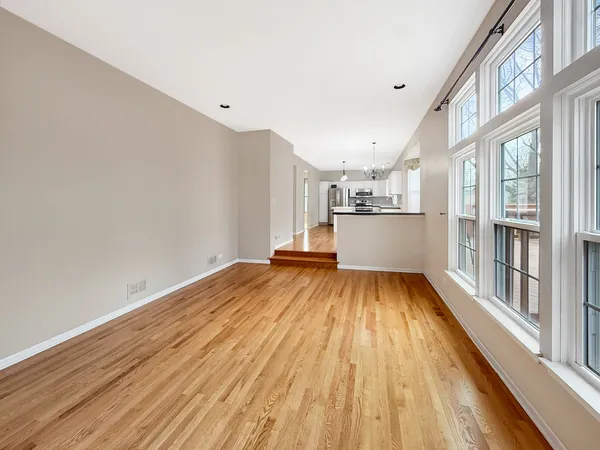 a view of a living room with a large window