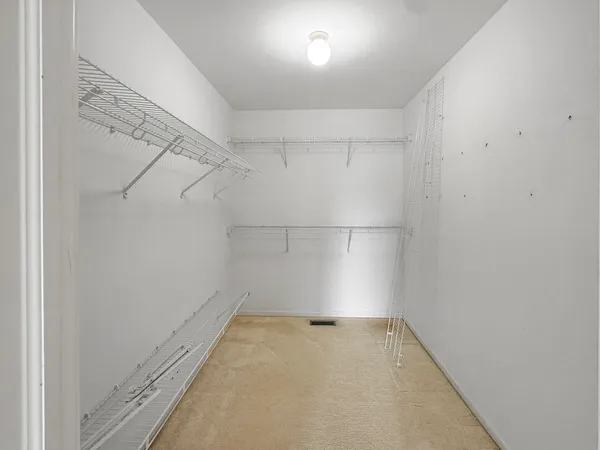 a view of a room with racks on the wall