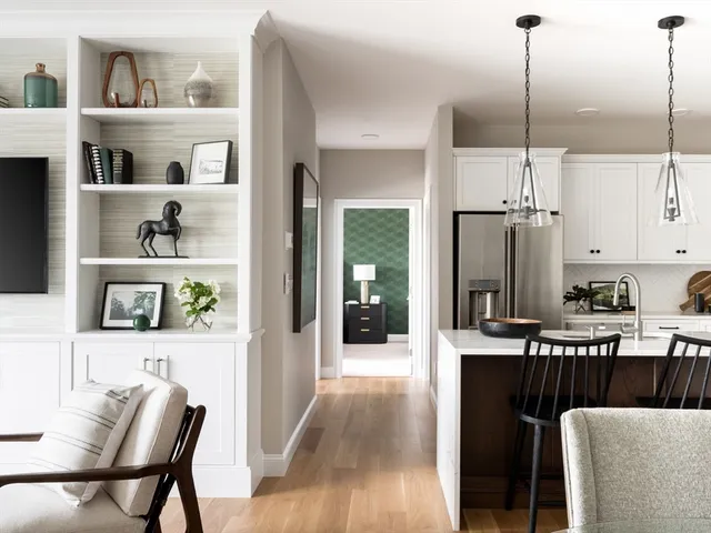 a view of kitchen with furniture and wooden floor