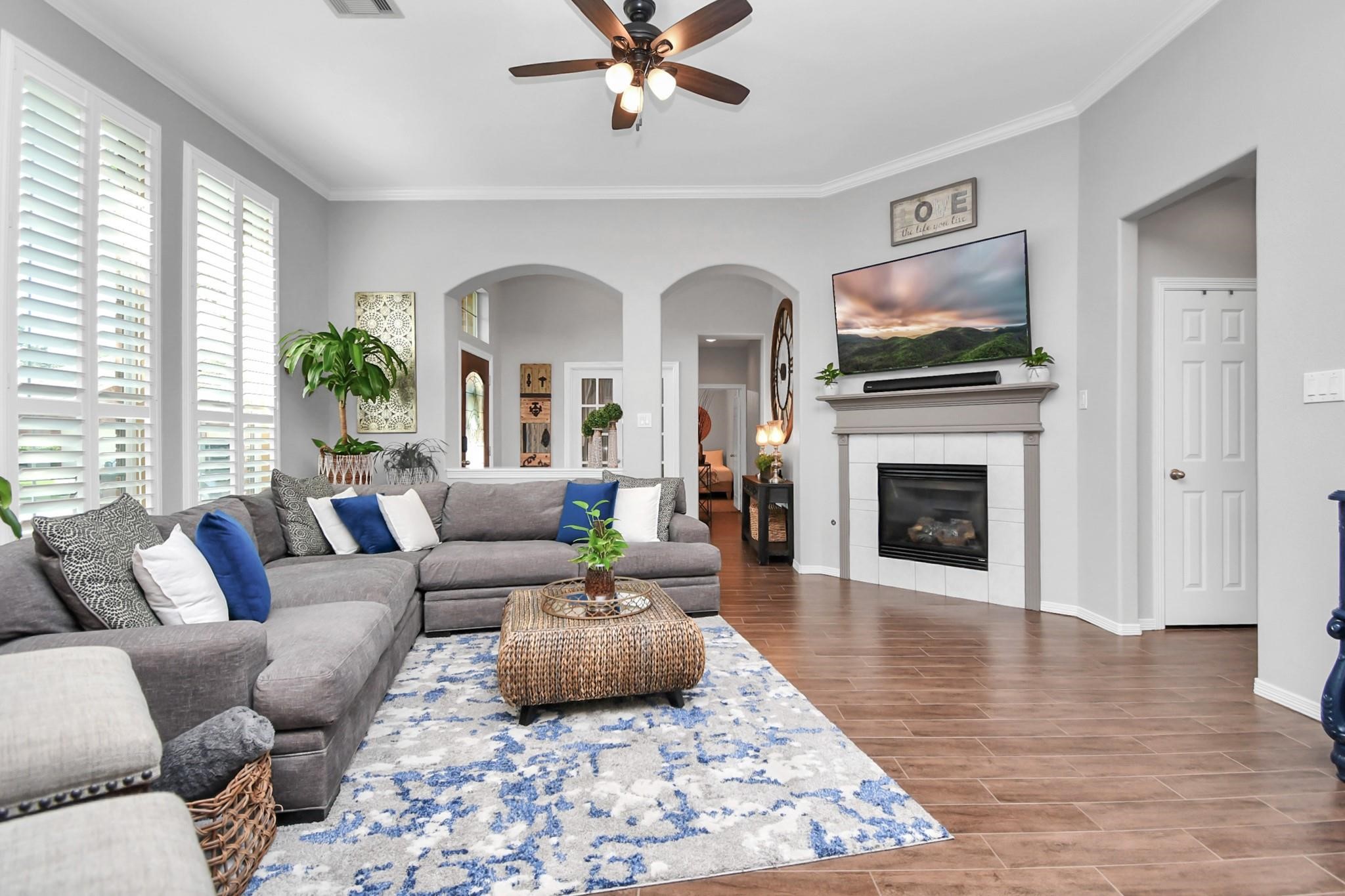 8624 Sunset Loch Drive Spring, TX 77379 - Photo 7 of 44 a living room with furniture fireplace and window
