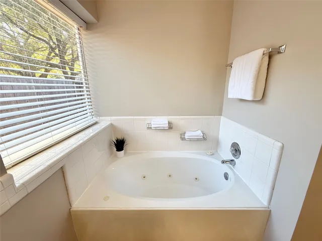 a bathroom with a bathtub