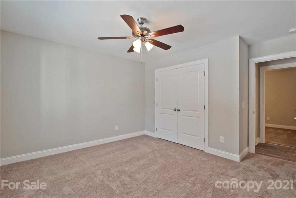 131 Powder Street Southwest Concord, NC 28025 - Photo 17 of 29 a view of an empty room
