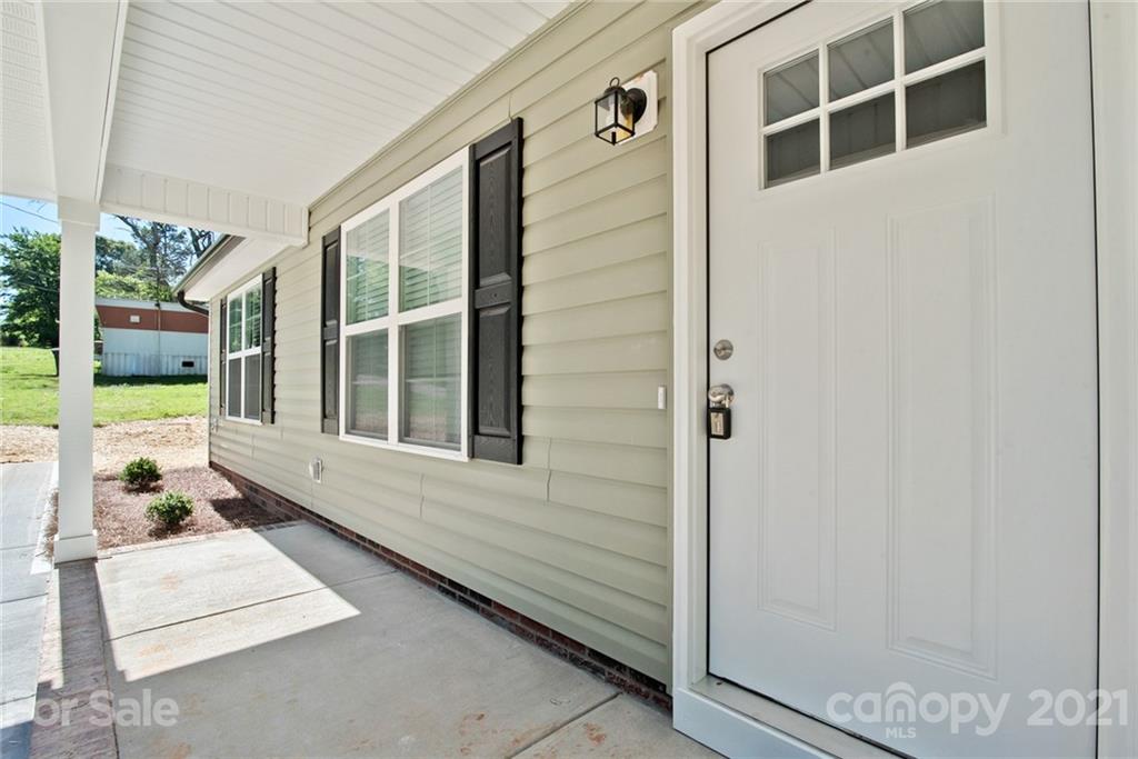 131 Powder Street Southwest Concord, NC 28025 - Photo 18 of 29 a balcony with view of the house