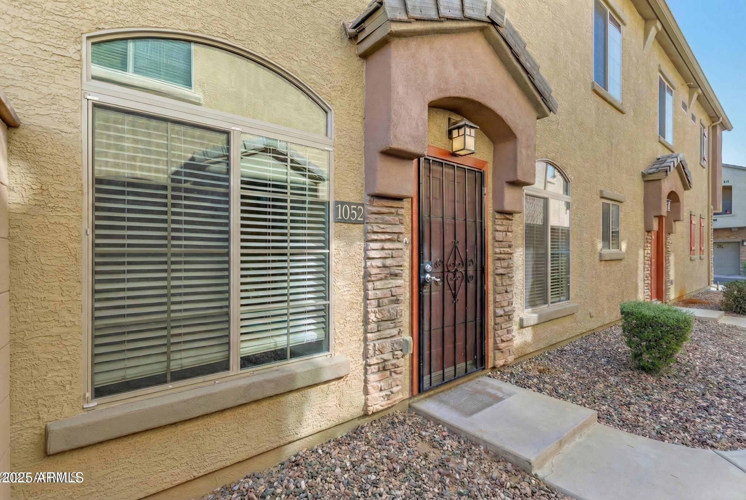 1350 South Greenfield Road, Unit 1052 Mesa, AZ 85206 - Photo 1 of 24 Greenfield front