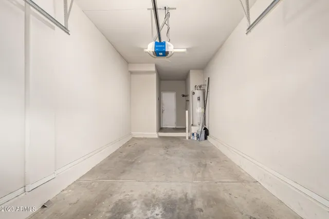 a view of a hallway with a chandelier