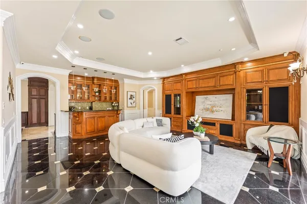 a kitchen with stainless steel appliances granite countertop a refrigerator and a stove