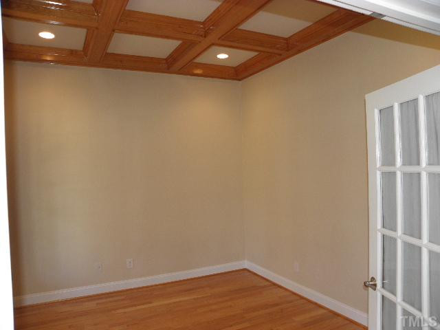 7009 Millstone Ridge Court Raleigh, NC 27614 - Photo 10 of 25 a view of an empty room with wooden floor