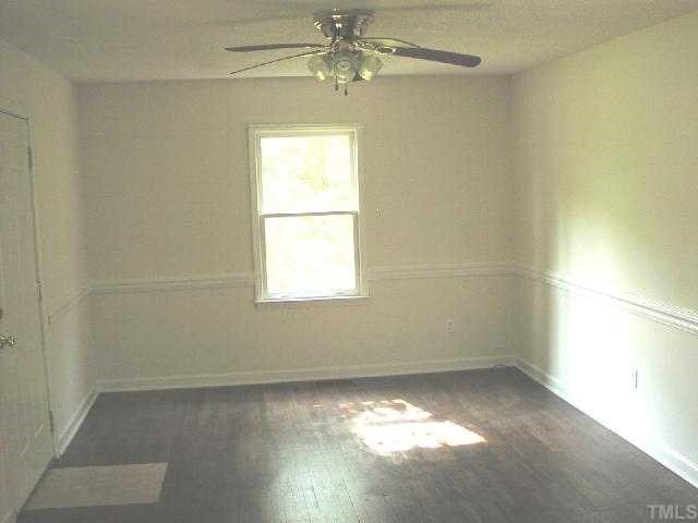 525 Steel Street Raleigh, NC 27603 - Photo 2 of 9 an empty room with a window