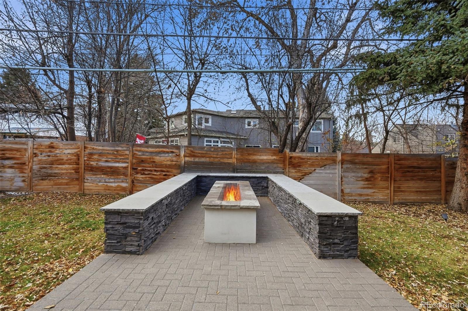 2757 South Steele Street Denver, CO 80210 - Photo 43 of 50 a swimming pool with some trees in the background