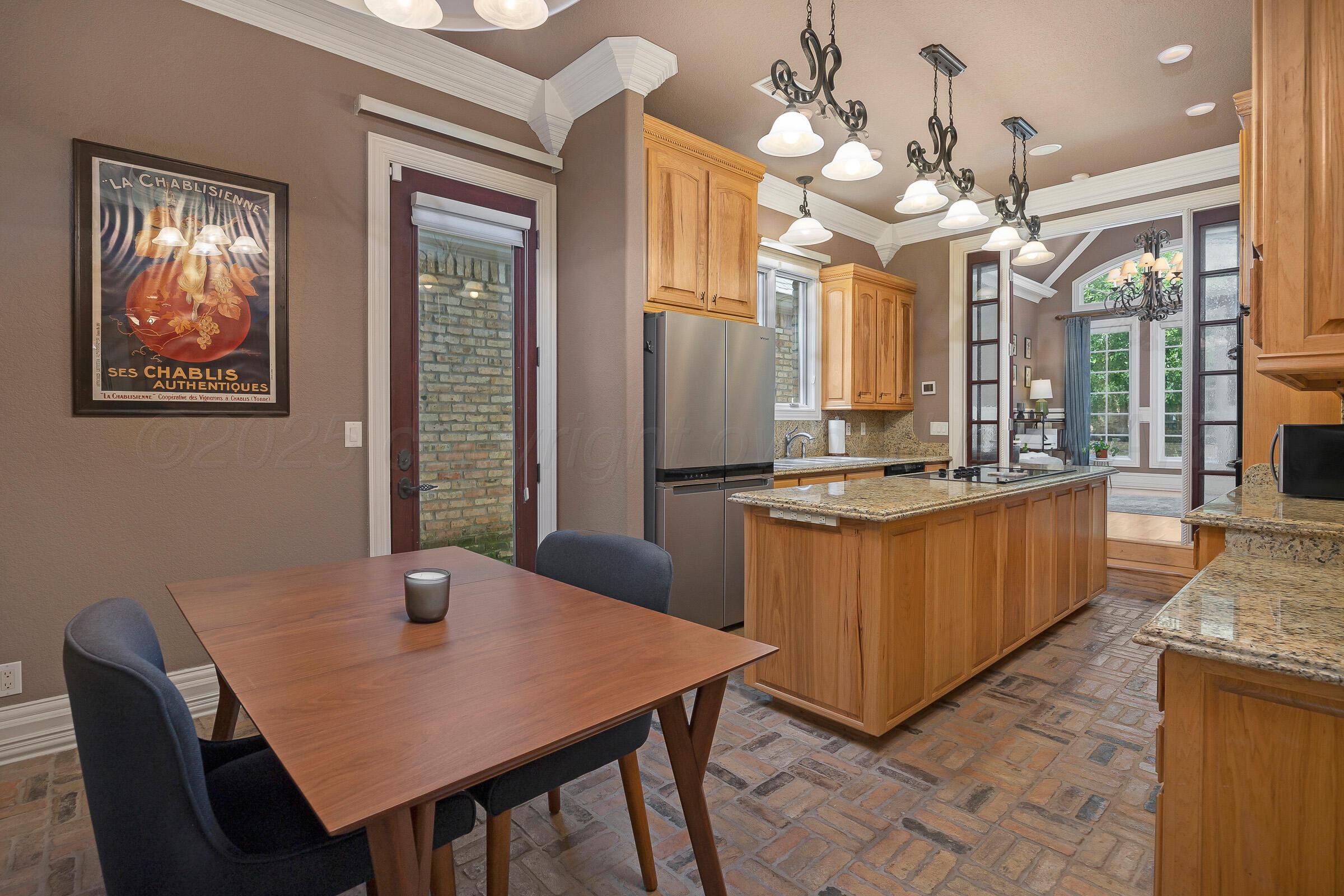 5121 Olsen Circle Amarillo, TX 79106 - Photo 8 of 39 11-Breakfast Room and Kitchen