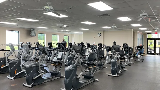 a large room with gym equipment