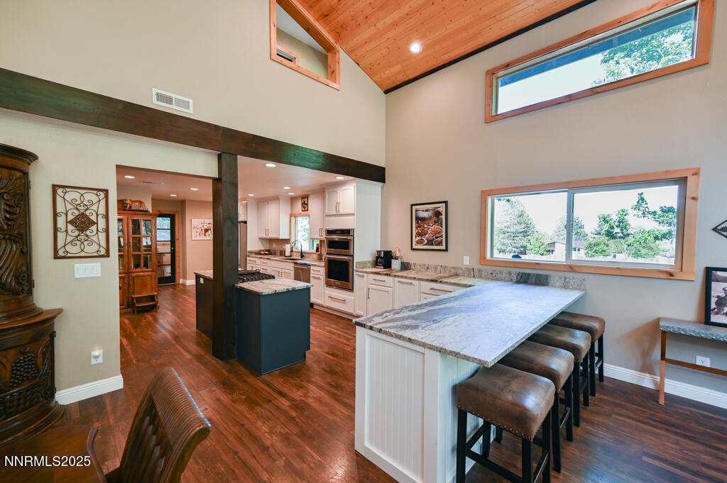 1147 Autumn Hills Road Gardnerville, NV 89460 - Photo 14 of 53 a kitchen with a table and chairs in it